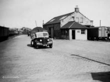 A load of coal leaves Kittybrewster Goods Yard for one of the Aberdeen paper mills in 1953. Today one would be looking at the retail units on Bedford Road from this position 