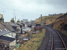 A view from the brake van as the train leaves Banff in April 1968
