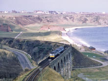 A green-blue liveried Swindon heads west for Elgin with the 11.29 ex Cairnie Junction, 13 Apr 1968,