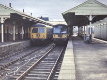 A pair of Cravens units rest at Keith Junction in April 1968, the platform supporting columns were apparently reused after demolition for the present Huntly Station.