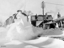 The Inverness plough clears the line through platform 1 at Keith in Jan 1960.  No doubt to everyone's delight except the porter who has just cleared the platform.