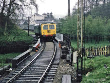 A Cravens crosses the Isla at Keith Town, the rear car is blue the front green, 