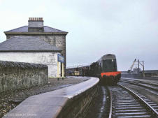 A class 20 waits to takes its train from Lossiemouth to Elgin in Sept 1963