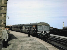 A Cravens DMU at Lossiemouth in June 1964 on a private charter after withdrawal of passenger services