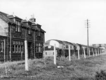 In this undated photo from the late Frank Guthrie collection an NB2 heads south through the closed Mormand Station