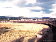The 18 coach grand Scottish tour snakes past Nethy Bridge Station on 25 Mar 1967 behind D5070 and D5127
